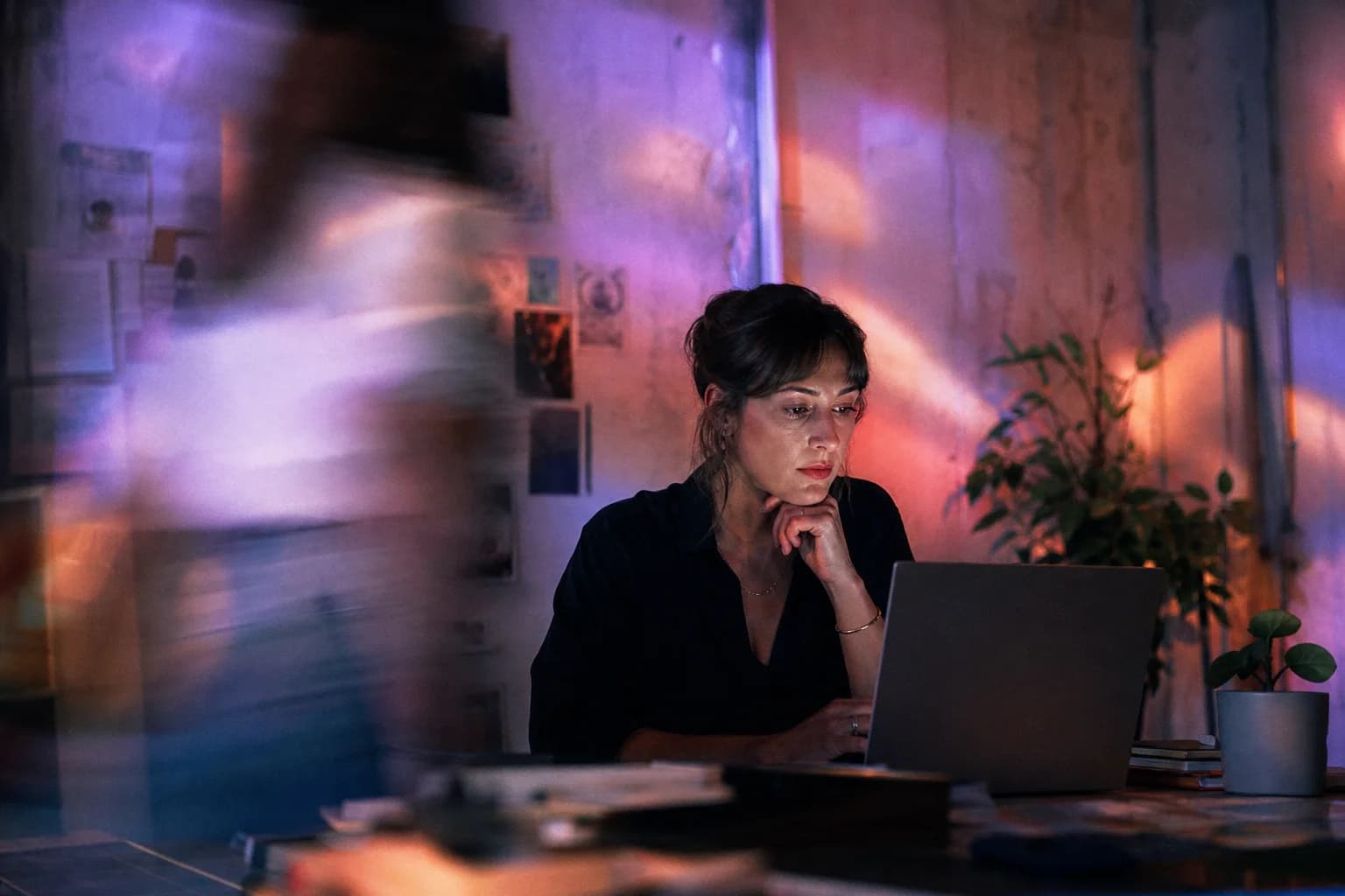 Marketer planning an AI agent workflow as a colleague moves through the studio